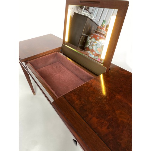 106 - DORCHESTER DRESSING TABLE, French style gilt metal mounted mahogany with drawer and rising illuminat... 