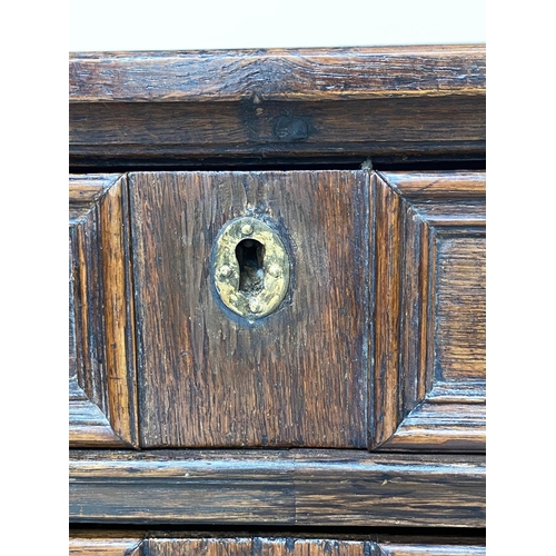 127 - CHEST, late 17th century English Jacobean oak with four long drawers, 91cm W x 55cm D x 81cm H.