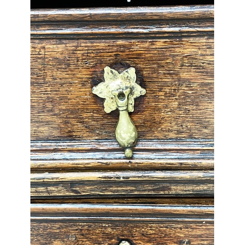 127 - CHEST, late 17th century English Jacobean oak with four long drawers, 91cm W x 55cm D x 81cm H.