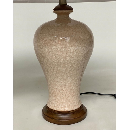 134 - TABLE LAMPS, a Chinese cream ceramic of baluster vase form with crackelure effect and silk style sha... 