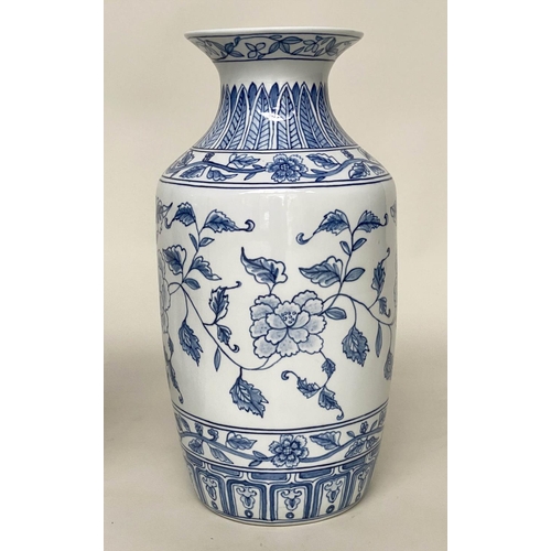 138 - TEMPLE VASES, a pair, Chinese blue and white ceramic peonies and fern collar, 45cm H. (2)