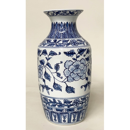 138 - TEMPLE VASES, a pair, Chinese blue and white ceramic peonies and fern collar, 45cm H. (2)