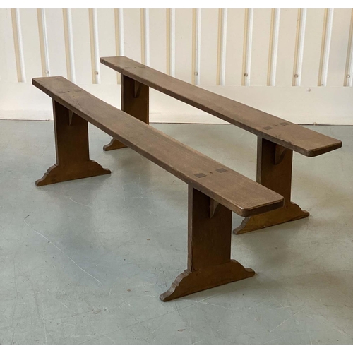 124 - REFECTORY BENCHES, a pair, solid oak rectangular with joined trestle slab supports, 194cm x 40cm D x... 