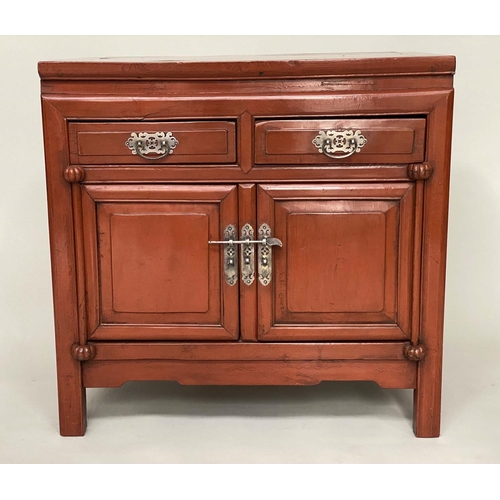 193 - CHINESE CABINET, early 20th century scarlet lacquered firwood with silvered mounts, two drawers and ... 