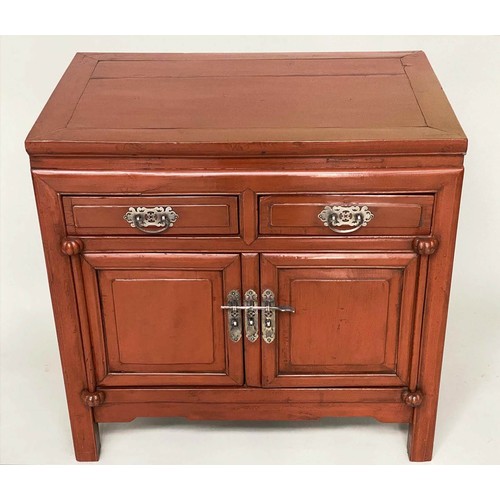 193 - CHINESE CABINET, early 20th century scarlet lacquered firwood with silvered mounts, two drawers and ... 