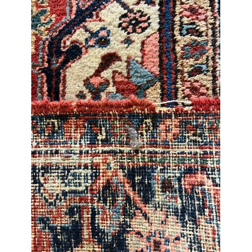 67 - ANTIQUE PERSIAN HERIZ CARPET, 314cm x 230cm.