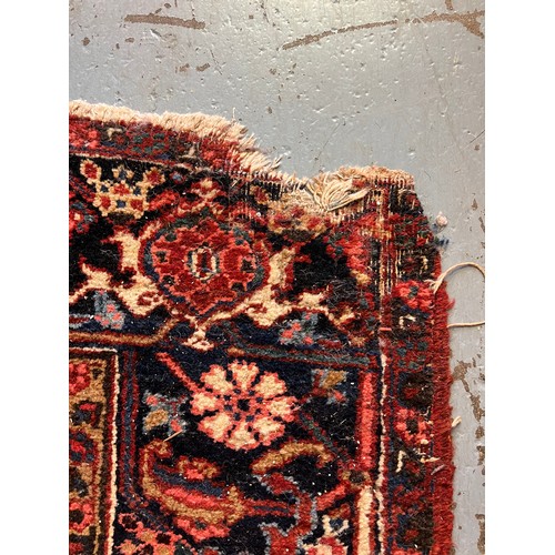 67 - ANTIQUE PERSIAN HERIZ CARPET, 314cm x 230cm.