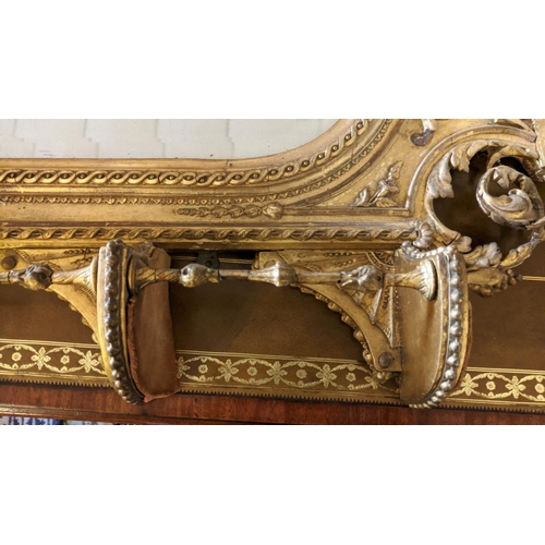 199 - WITHDRAWN - WALL MIRROR, 108cm H x 56cm, Victorian gilt with an arched bevelled plate and elaborate ... 