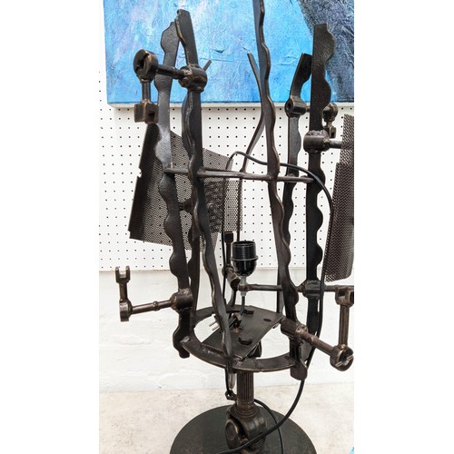 423 - SURREALIST INSPIRED TABLE LAMP, 77cm H, bronzed metal.