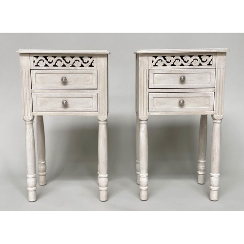 101 - BEDSIDE CHESTS/TABLES, a pair, French style grey painted each with pierced frieze and two drawers, 4... 