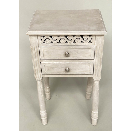 101 - BEDSIDE CHESTS/TABLES, a pair, French style grey painted each with pierced frieze and two drawers, 4... 