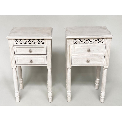 101 - BEDSIDE CHESTS/TABLES, a pair, French style grey painted each with pierced frieze and two drawers, 4... 