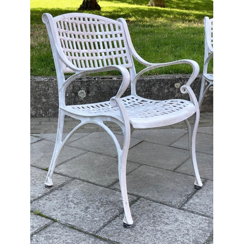 112 - GARDEN TABLE AND CHAIRS, painted cast aluminium lattice work with circular table and four armchairs,... 