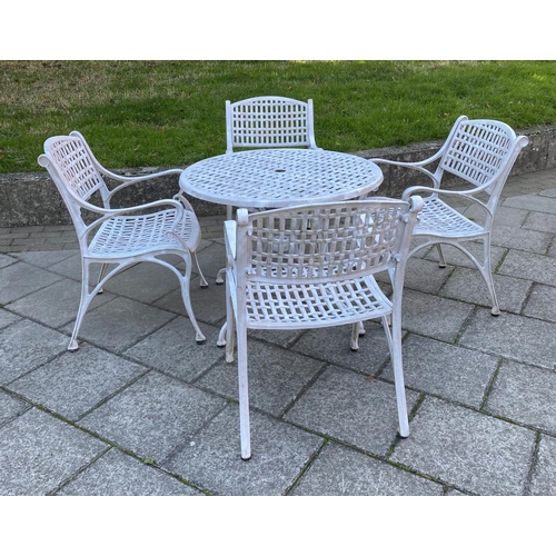 112 - GARDEN TABLE AND CHAIRS, painted cast aluminium lattice work with circular table and four armchairs,... 