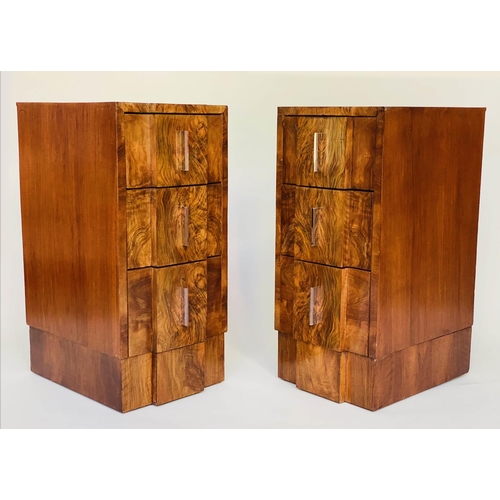 114 - ART DECO BEDSIDE CHESTS, a pair, figured walnut each breakfront with three drawers, 35cm W x 48cm D ... 