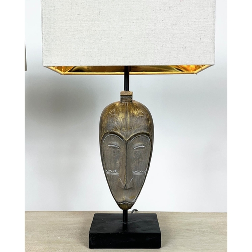 123 - TABLE LAMPS, a pair, African Tribal mask design, with shades, 49cm H. (2)