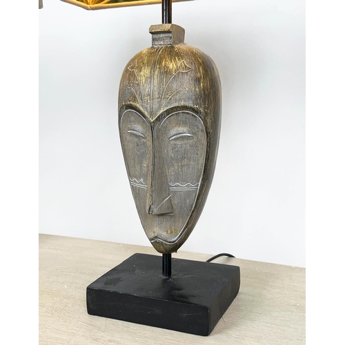 123 - TABLE LAMPS, a pair, African Tribal mask design, with shades, 49cm H. (2)