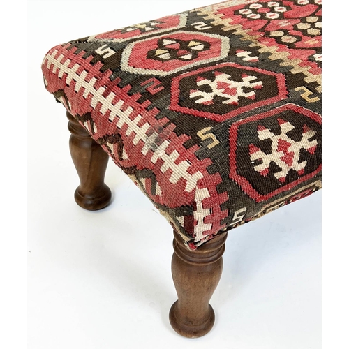 151 - KILIM FOOTSTOOL, raised on turned wooden legs, 32cm H x 65cm x 42cm.