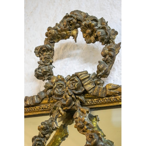 152 - PIER MIRROR, 214cm H x 58cm W, late 19th century giltwood and gesso with cherub and wreath decoratio... 