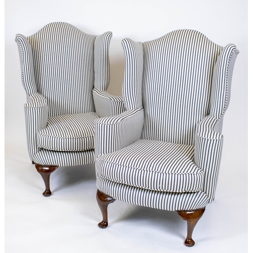 156 - WING ARMCHAIRS, 116cm H x 77cm W, a pair, Georgian style walnut in new ticking upholstery. (2)