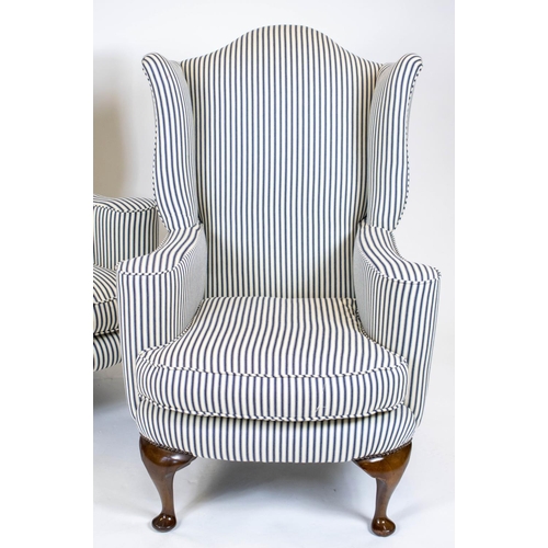 156 - WING ARMCHAIRS, 116cm H x 77cm W, a pair, Georgian style walnut in new ticking upholstery. (2)