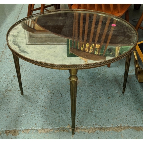 196 - LOW TABLE, 71cm W, with a pierced brass gallery and distressed mirrored top on tapered distressed an... 