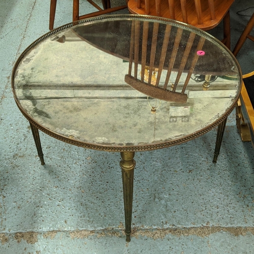 196 - LOW TABLE, 71cm W, with a pierced brass gallery and distressed mirrored top on tapered distressed an... 