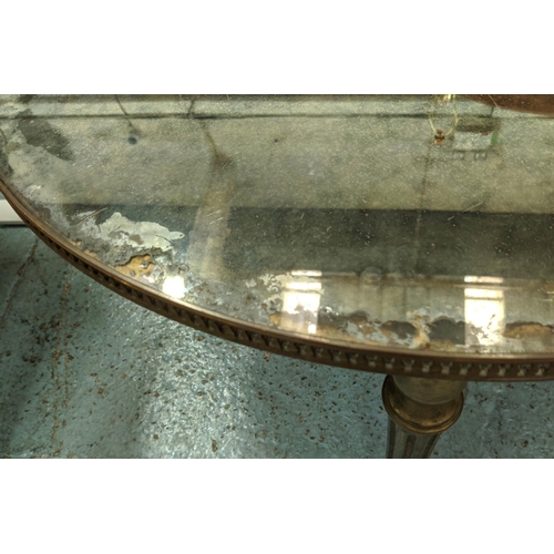 196 - LOW TABLE, 71cm W, with a pierced brass gallery and distressed mirrored top on tapered distressed an... 