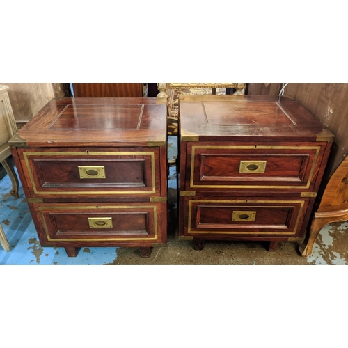 204 - CAMPAIGN STYLE BEDSIDE CHESTS, a pair, 54cm W x 59cm H x 46cm D brass bound each with two short draw... 