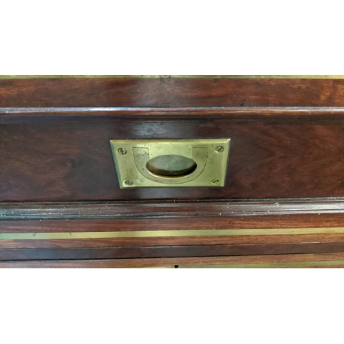 204 - CAMPAIGN STYLE BEDSIDE CHESTS, a pair, 54cm W x 59cm H x 46cm D brass bound each with two short draw... 