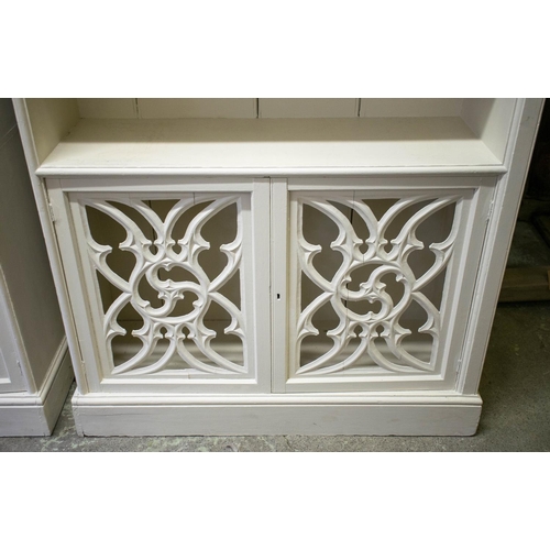 217 - BOOKCASES, 224cm H x 110cm W x 38cm D, a pair, Gothic revival white painted, each with fixed open sh... 