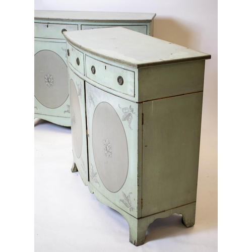 218 - BOWFRONT SIDE CABINETS, a near pair, Edwardian green and grey painted, each with two drawers above t... 