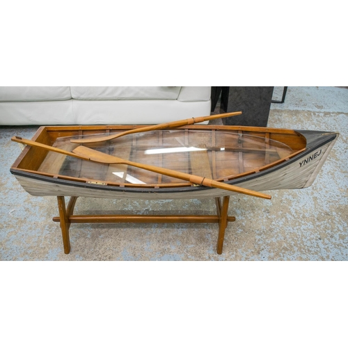 281 - BOAT LOW TABLE, 50cm H x 143cm W x 58cm D, painted wood modelled as a rowing boat on stand with inse... 