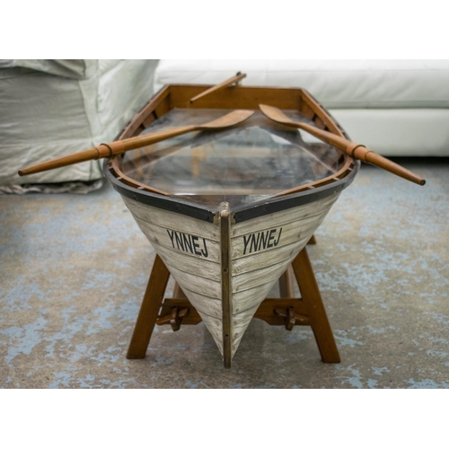 281 - BOAT LOW TABLE, 50cm H x 143cm W x 58cm D, painted wood modelled as a rowing boat on stand with inse... 