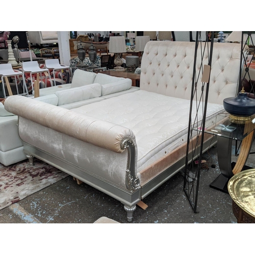 303 - DOUBLE BED, 173cm W x 140cm H, in a Champagne coloured velvet with a silver gilt frame, with a Hypno... 