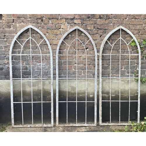 358 - GOTHIC STYLE WINDOW FRAMES, 160cm H x 67cm W, a set of three, distressed painted finish, metal frame... 