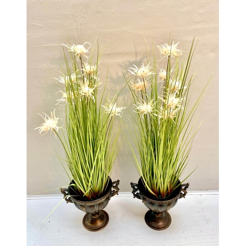 360 - FAUX GOLDEN OATS GRASS PLANTS, pair, 80cm H x 30cm W approx., in twin handled pedestal urns, antique... 