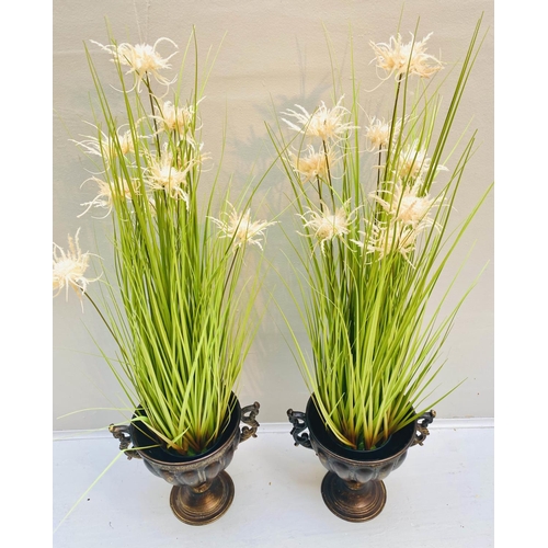 360 - FAUX GOLDEN OATS GRASS PLANTS, pair, 80cm H x 30cm W approx., in twin handled pedestal urns, antique... 