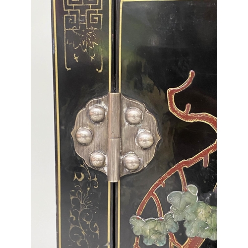 87 - CHINESE SIDE CABINET, black lacquered and hardstone and Chinoiserie decorated with two panelled door... 