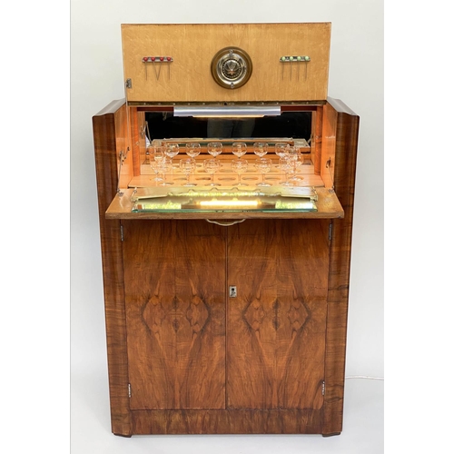 91 - COCKTAIL CABINET, Art Deco period figured walnut with rising lid enclosing lit fitted interior above... 