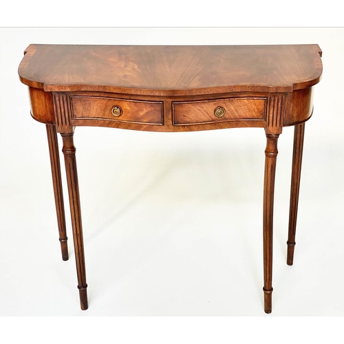 93 - HALL TABLE, George III style flame mahogany of serpentine outline with frieze drawer and tapering su... 