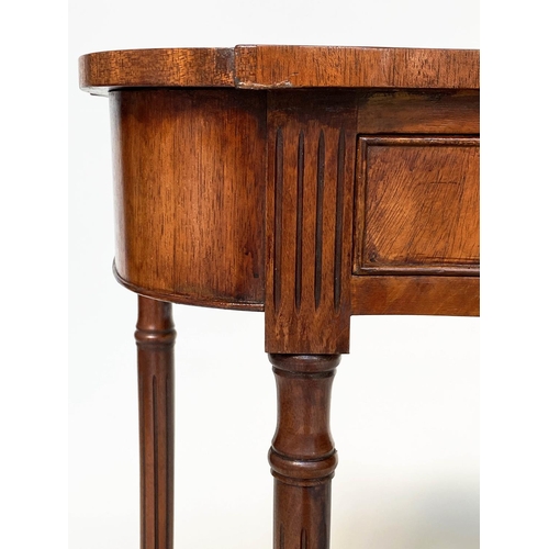 93 - HALL TABLE, George III style flame mahogany of serpentine outline with frieze drawer and tapering su... 