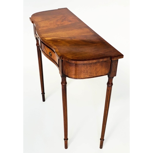 93 - HALL TABLE, George III style flame mahogany of serpentine outline with frieze drawer and tapering su... 