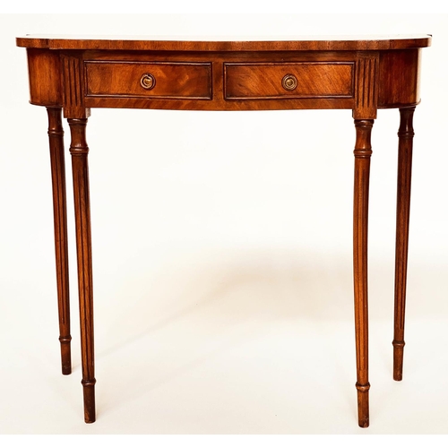 93 - HALL TABLE, George III style flame mahogany of serpentine outline with frieze drawer and tapering su... 