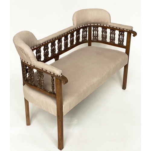 96 - HALL BENCH, early 20th century linen upholstered with Moorish style pierced fretwork back, 107cm W.