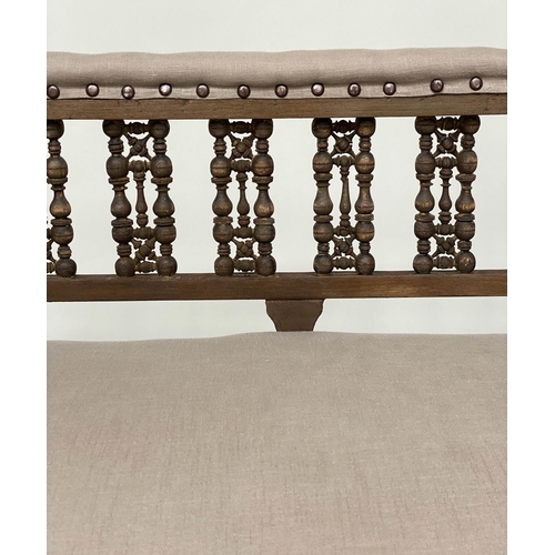 96 - HALL BENCH, early 20th century linen upholstered with Moorish style pierced fretwork back, 107cm W.