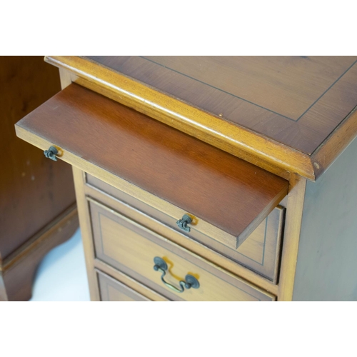 223 - BEDSIDE CHESTS, 61cm H x 38cm x 43cm, a pair, Georgian style yewwood, each with slide above three dr... 