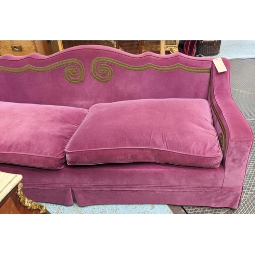 227 - SOFA, 225cm W x 88cm H x 88cm D, in purple velvet with applied braid and a shaped back.