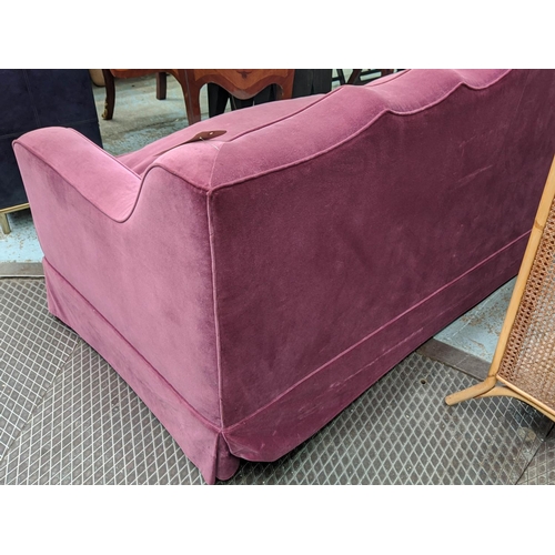 227 - SOFA, 225cm W x 88cm H x 88cm D, in purple velvet with applied braid and a shaped back.