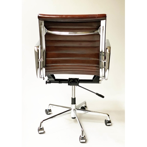 109 - REVOLVING DESK CHAIR, Charles and Ray Eames inspired with ribbed tan leather seat revolving and recl... 